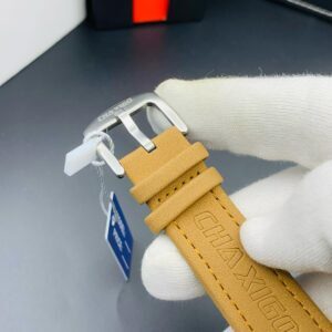 Elegant Chronograph Wristwatch with Textured Dial and Leather Strap