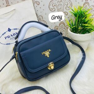 Designer-Inspired Compact Shoulder Bag with Top Handle and Gold Lock Closure