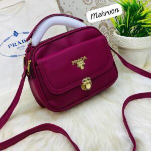 Designer-Inspired Compact Shoulder Bag with Top Handle and Gold Lock Closure