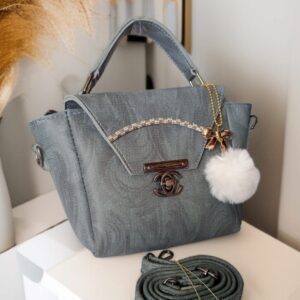 Chic Designer-Inspired Top Handle Bag with Fur Charm and Adjustable Strap
