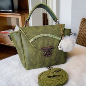 Chic Designer-Inspired Top Handle Bag with Fur Charm and Adjustable Strap