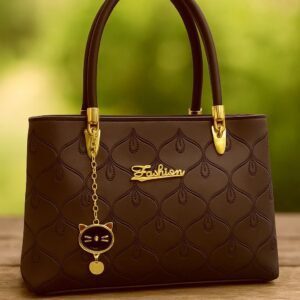 Elegant Handbag with Quilted Design and Cat Charm