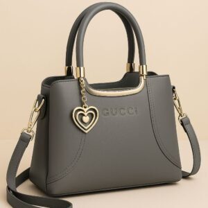 Gucci Structured Handbag with Dual Handles and Heart Charm Accent