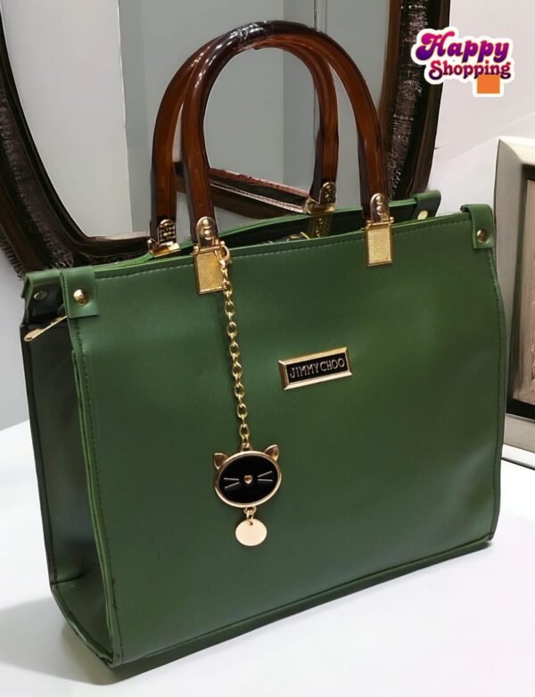 Elegant Handbag with Cat Charm and Acrylic Handles
