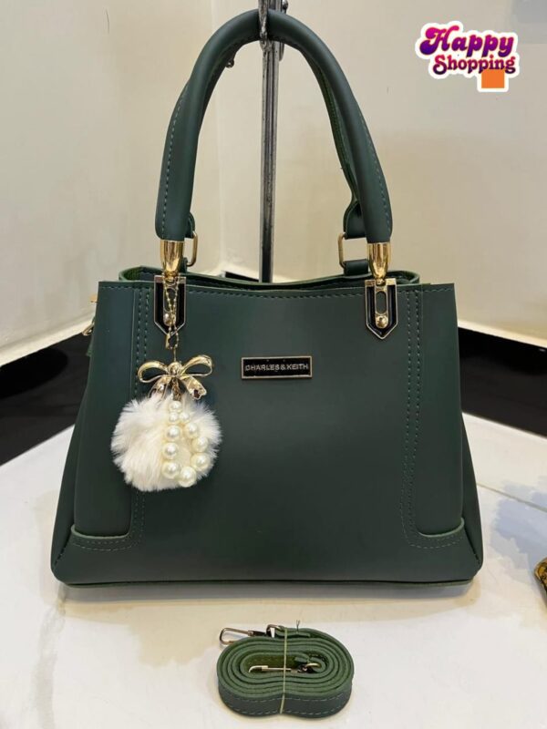 Elegant Handbag with Pearl Charm & Adjustable Strap – Charles & Keith Design
