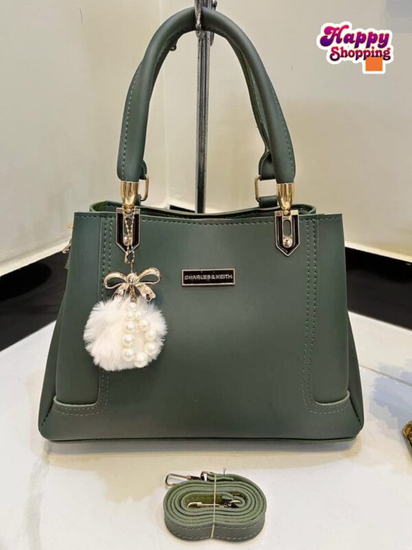 Elegant Handbag with Pearl Charm & Adjustable Strap – Charles & Keith Design