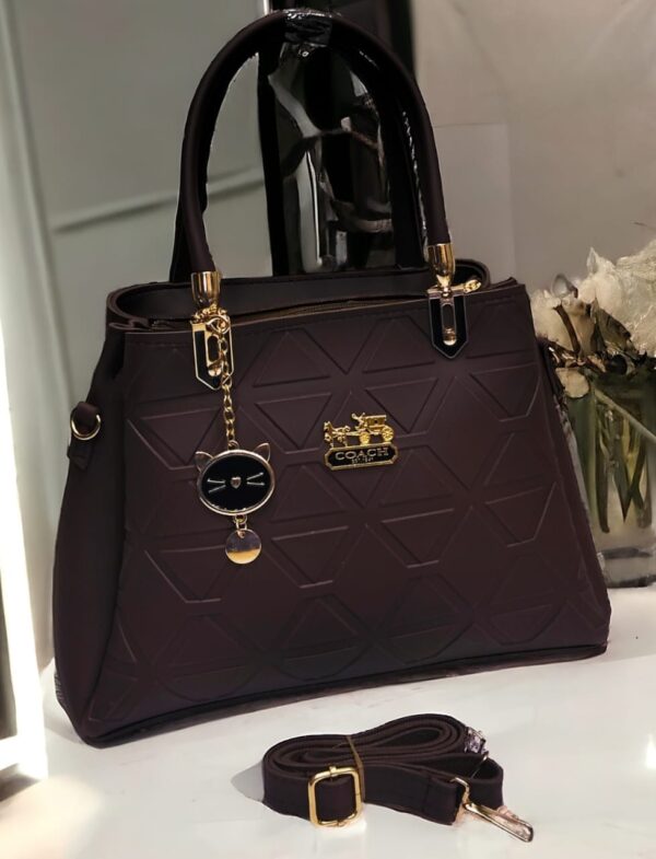 Geometric Pattern Handbag with Cat Charm & Adjustable Strap – Coach Inspired