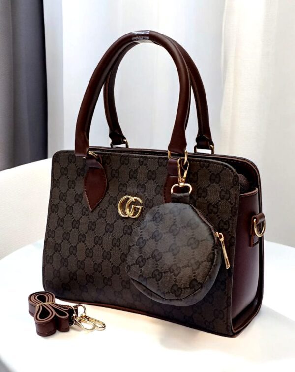 Luxury Branded Handbag With Round Pouch And Adjustable Strap