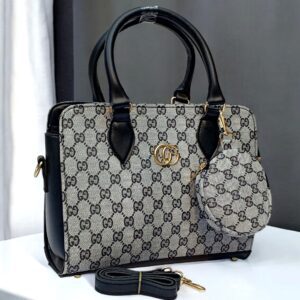 Luxury Branded Handbag With Round Pouch And Adjustable Strap