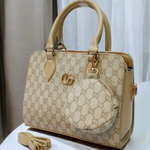 Luxury Branded Handbag With Round Pouch And Adjustable Strap