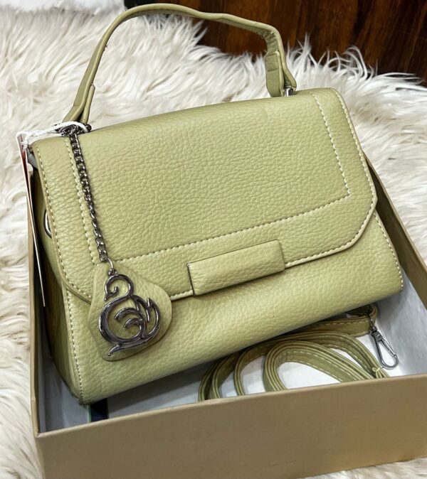 Elegant Textured Leather Handbag With Chain Charm Accent