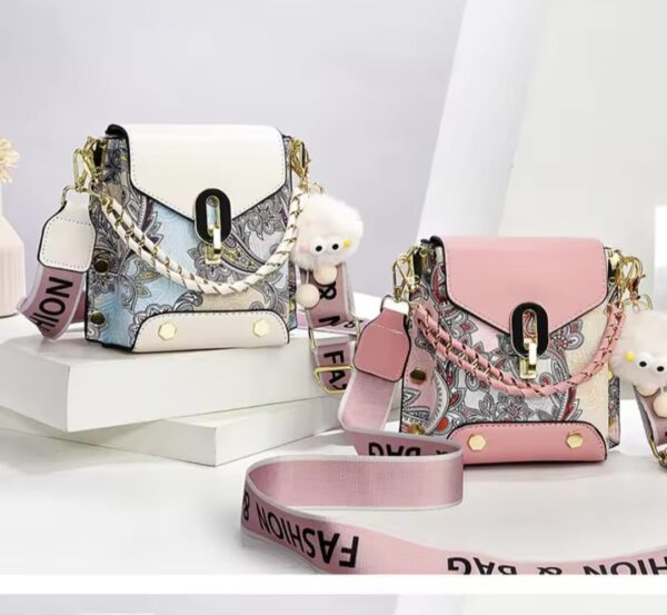 Trendy Floral Crossbody Bag with Chain Detail and Plush Charm