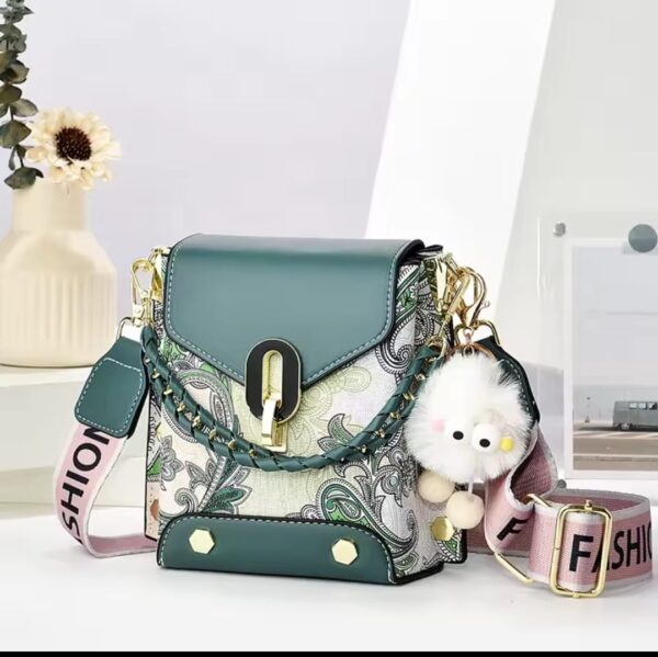 Trendy Floral Crossbody Bag with Chain Detail and Plush Charm