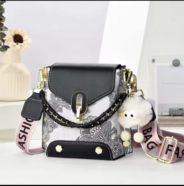 Trendy Floral Crossbody Bag with Chain Detail and Plush Charm