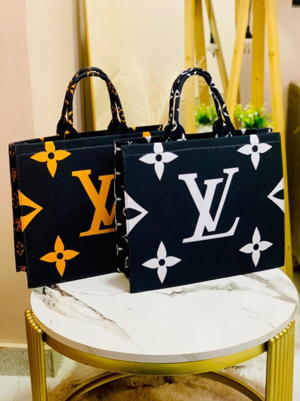 Luxury Designer-Inspired Tote Bag with Bold Monogram and Floral Accents