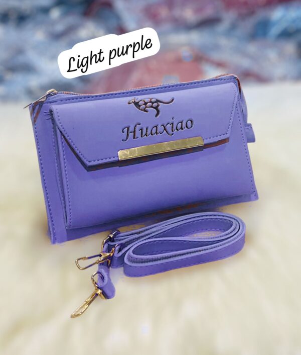 Stylish Huaxiao Crossbody Sling Bag with Front Flap and Adjustable Strap