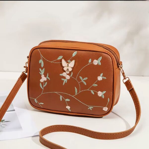 Floral Charm Crossbody Bag with Elegant Butterfly Accent