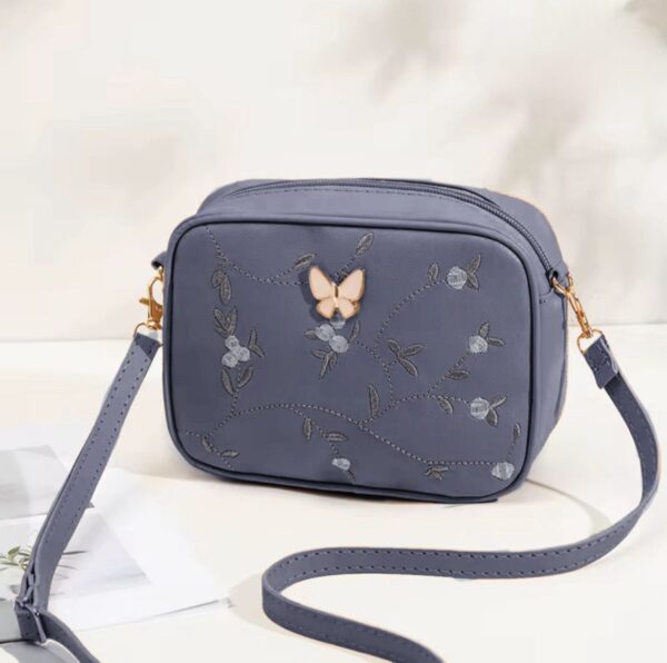 Floral Charm Crossbody Bag with Elegant Butterfly Accent