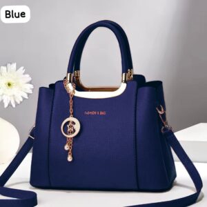 Elegant Handbag with Star Charm Pendant and Structured Design