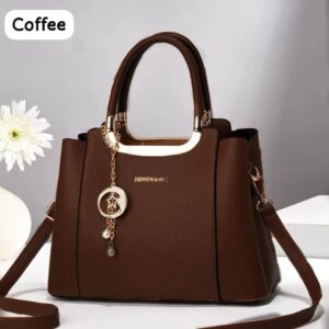 Elegant Handbag with Star Charm Pendant and Structured Design