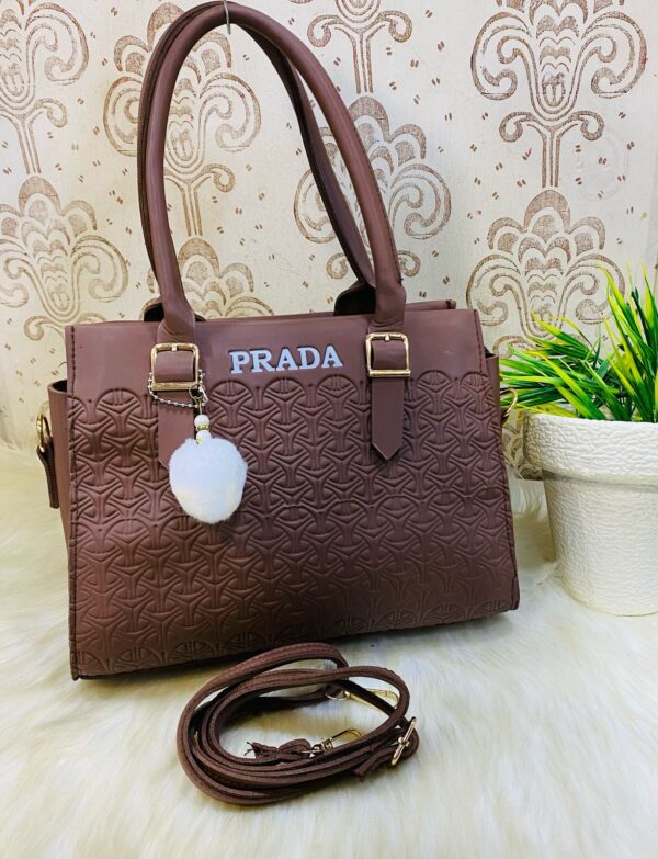 Geometric Luxe Handbag with Plush Charm