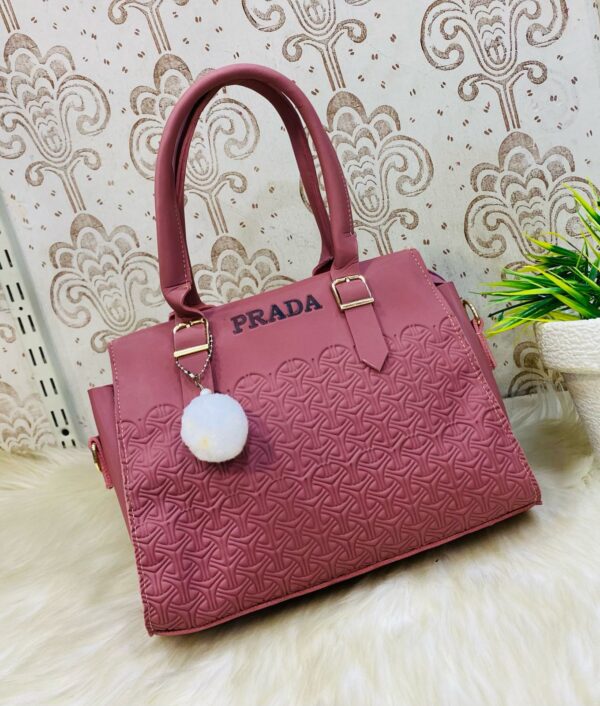 Geometric Luxe Handbag with Plush Charm