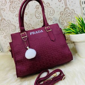 Geometric Luxe Handbag with Plush Charm