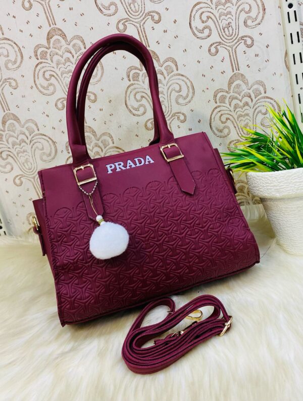 Geometric Luxe Handbag with Plush Charm