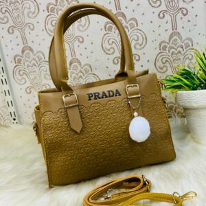 Geometric Luxe Handbag with Plush Charm