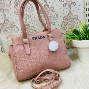 Geometric Luxe Handbag with Plush Charm