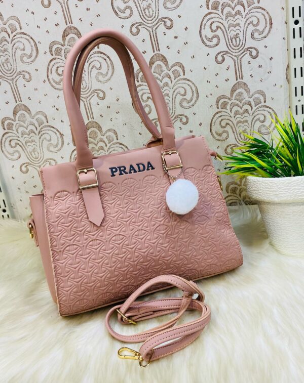 Geometric Luxe Handbag with Plush Charm