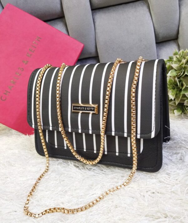 Striped Shoulder Bag with Gold Chain Detailing by Charles & Keith