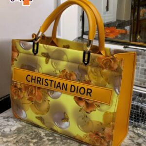 Floral Pattern Christian Dior Tote with Glossy Finish and Gold Handle Accents