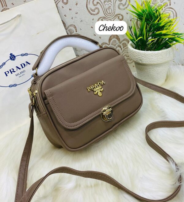 Designer-Inspired Compact Shoulder Bag with Top Handle and Gold Lock Closure