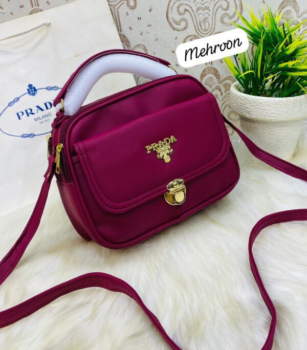 Designer-Inspired Compact Shoulder Bag with Top Handle and Gold Lock Closure