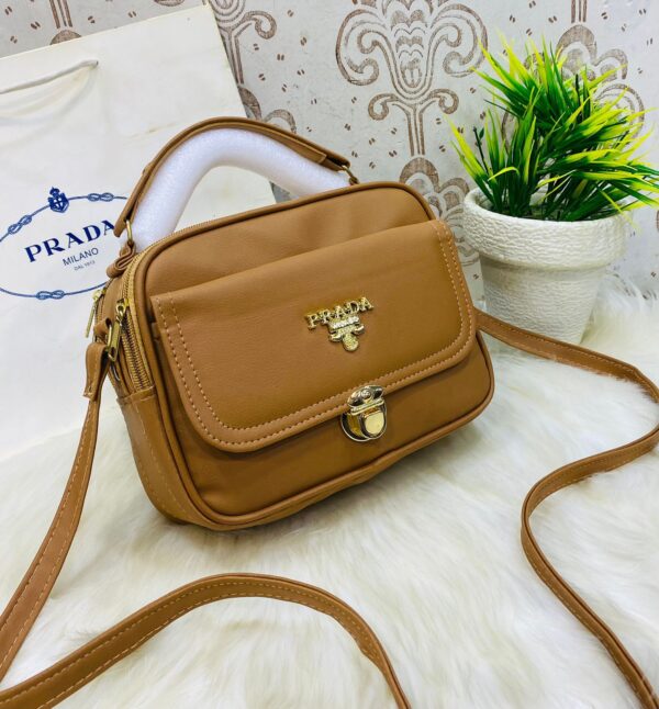 Designer-Inspired Compact Shoulder Bag with Top Handle and Gold Lock Closure