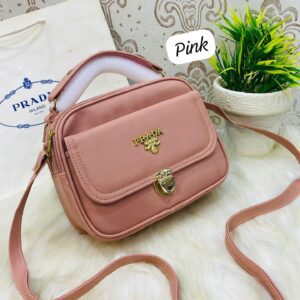 Designer-Inspired Compact Shoulder Bag with Top Handle and Gold Lock Closure
