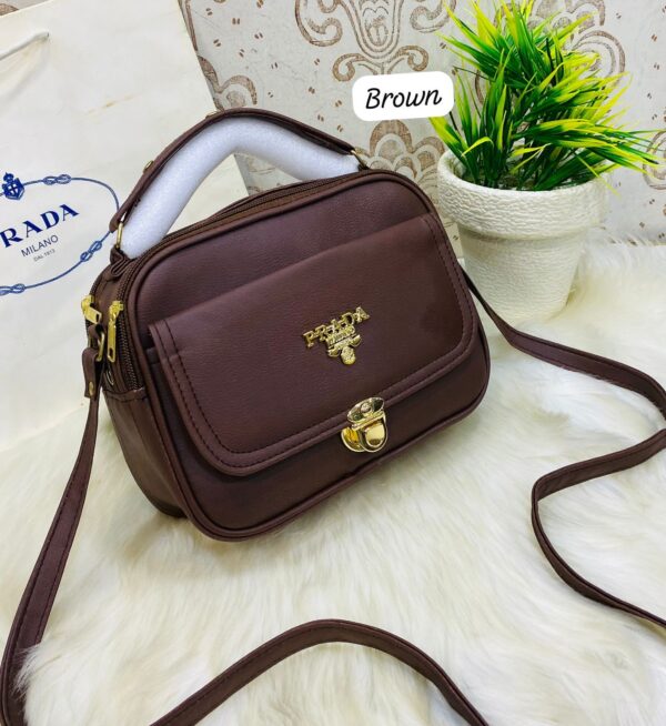 Designer-Inspired Compact Shoulder Bag with Top Handle and Gold Lock Closure