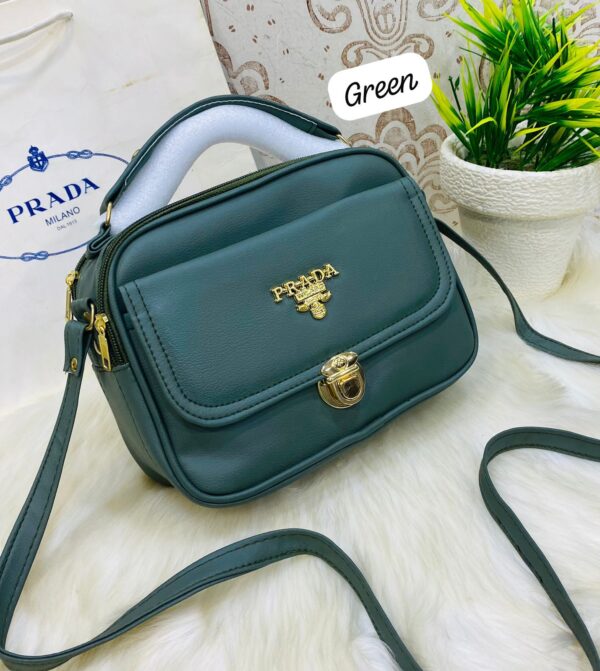 Designer-Inspired Compact Shoulder Bag with Top Handle and Gold Lock Closure