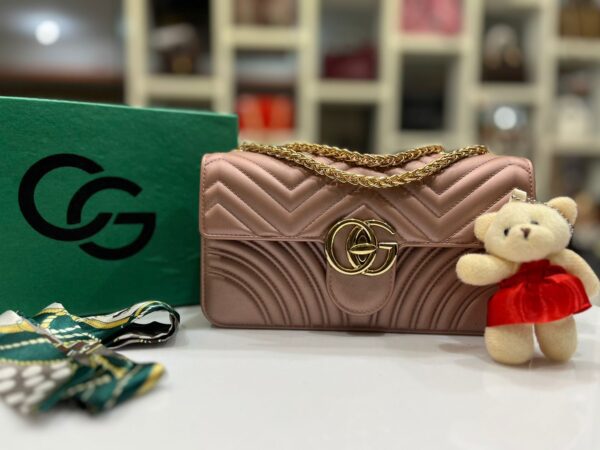 Gucci GG Marmont Matelassé Mini Bag with Teddy Bear Keychain