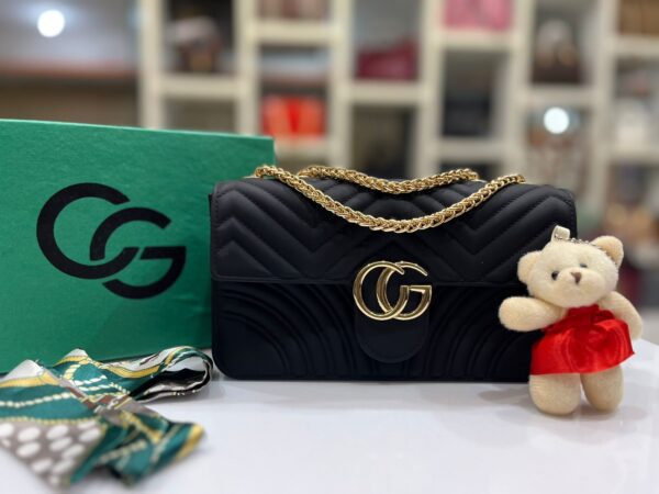 Gucci GG Marmont Matelassé Mini Bag with Teddy Bear Keychain