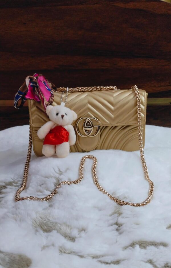 Gucci GG Marmont Matelassé Mini Bag with Teddy Bear Keychain
