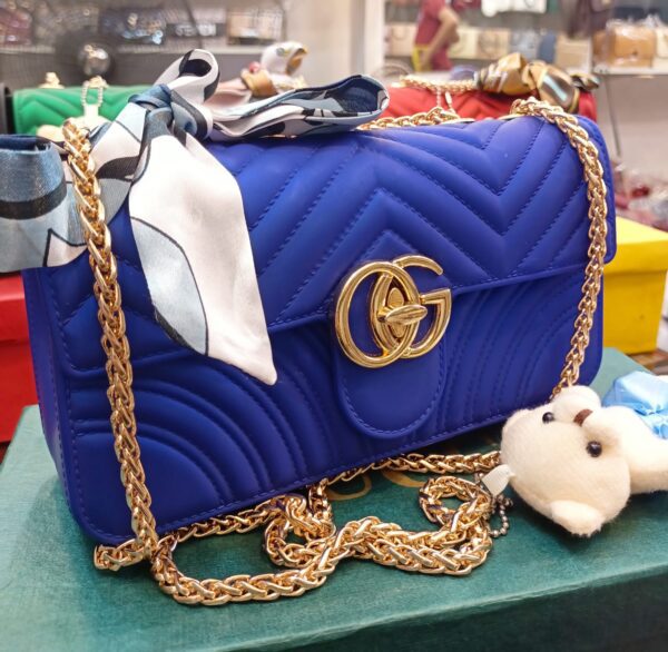 Gucci GG Marmont Matelassé Mini Bag with Teddy Bear Keychain