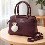 Structured Satchel with Bow-Accent Charm and Detachable Strap