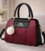 Elegant Dual Tone Handbag With Pom Pom Charm