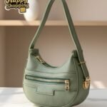 Crescent Textured Hobo Bag With Multi Zip Accents