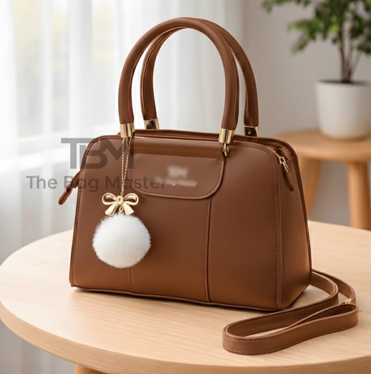 Structured Satchel with Bow-Accent Charm and Detachable Strap