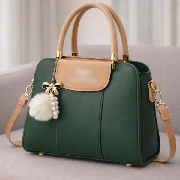 Elegant Dual Tone Handbag With Pom Pom Charm