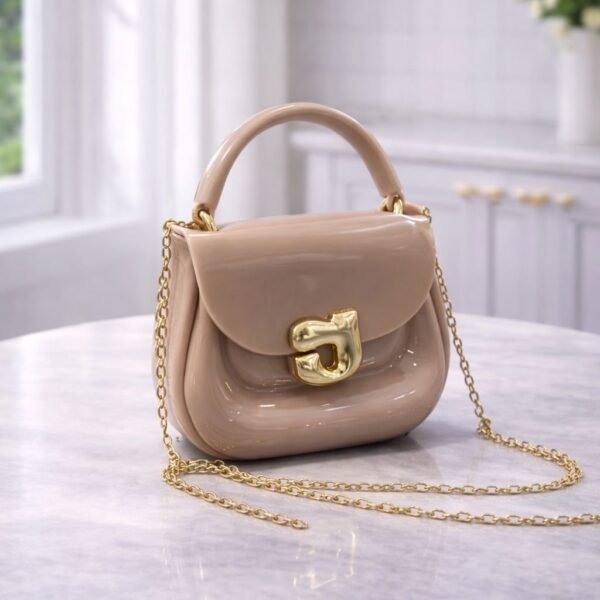 Polished Jelly Saddle Bag With Sculpted Metallic Clasp And Gold Tone Chain