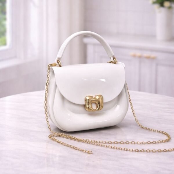 Polished Jelly Saddle Bag With Sculpted Metallic Clasp And Gold Tone Chain